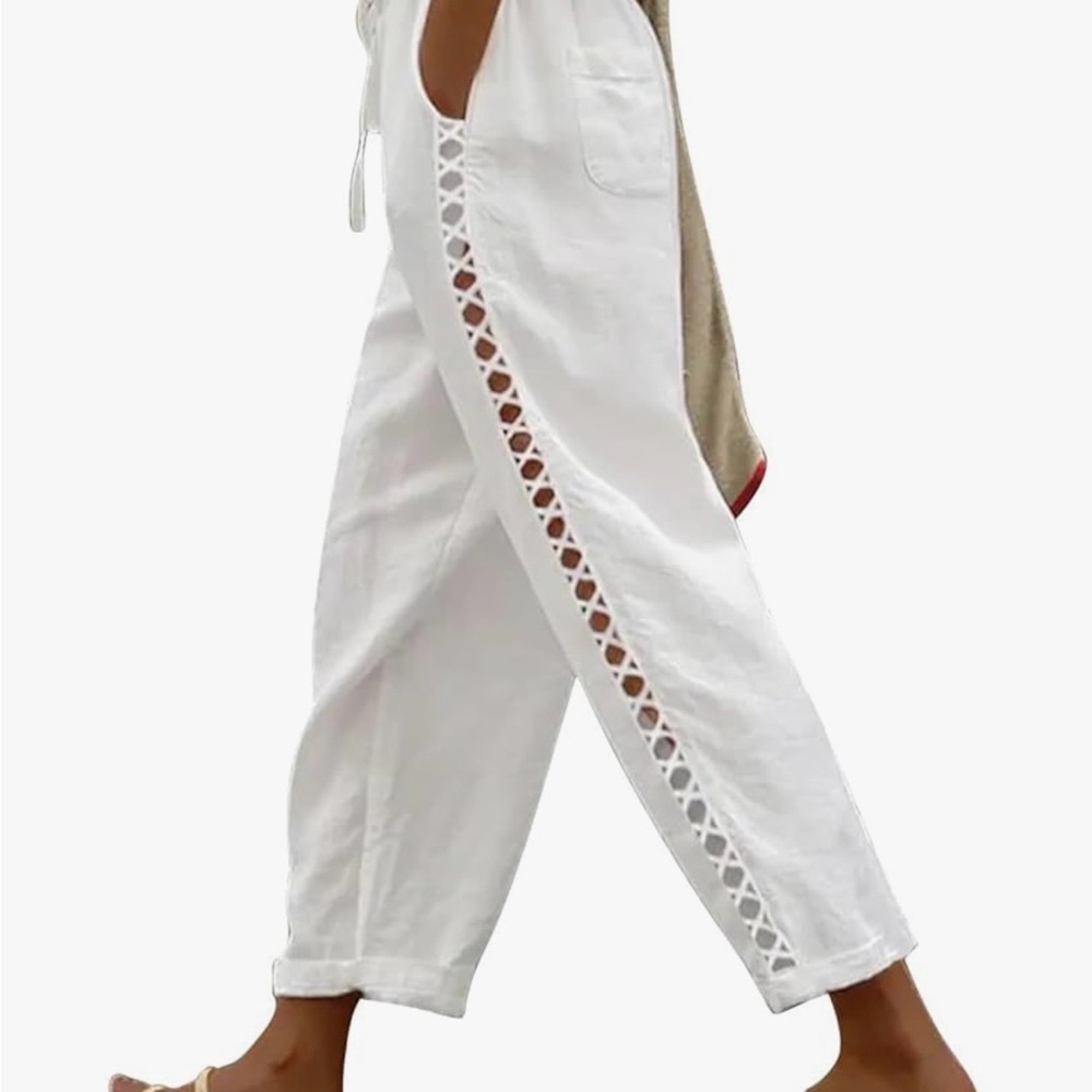 NWOT.  White linen like pants with cutout detail